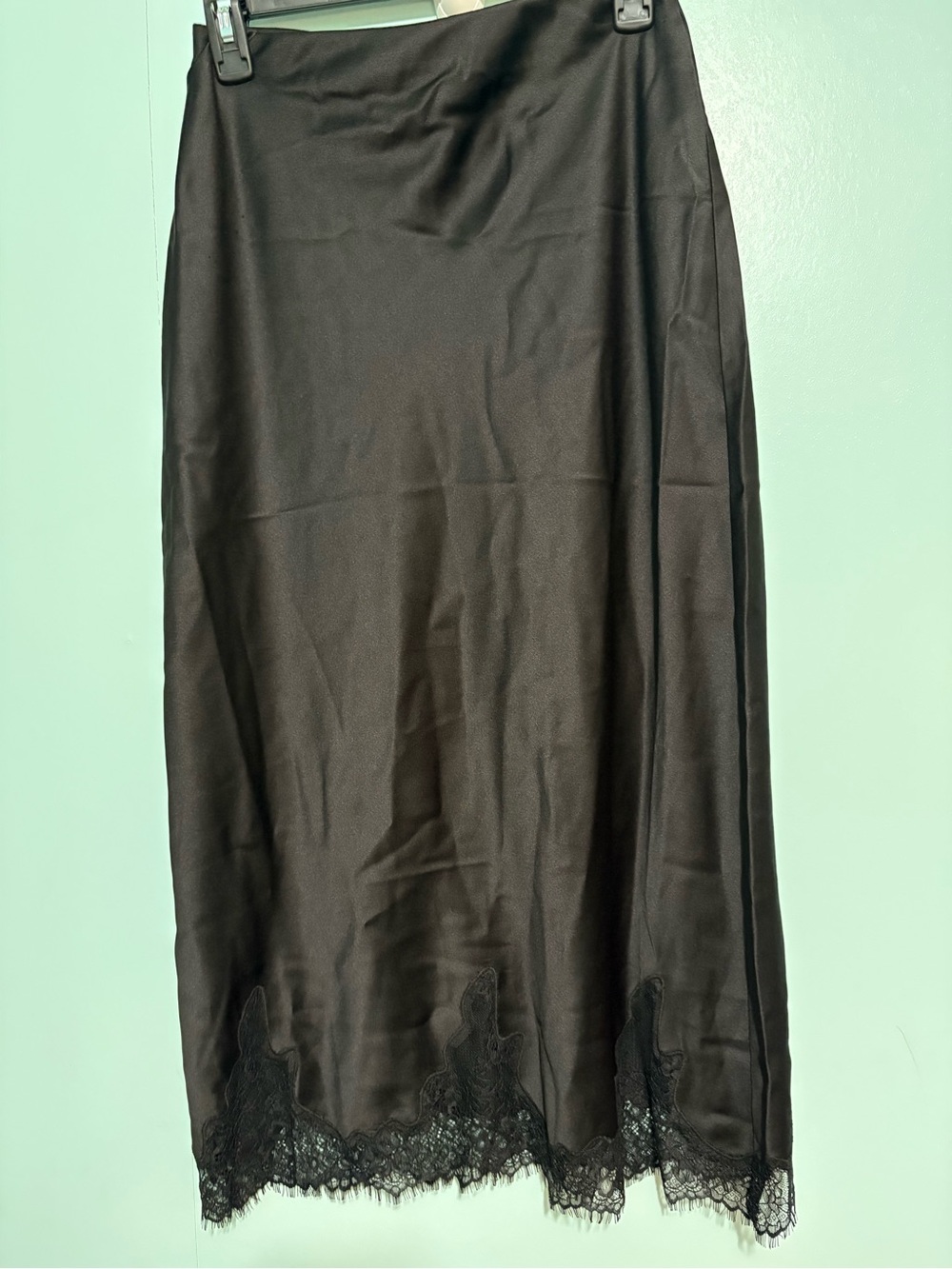 Sleek Black Midi Slip Skirt with Lace Hem